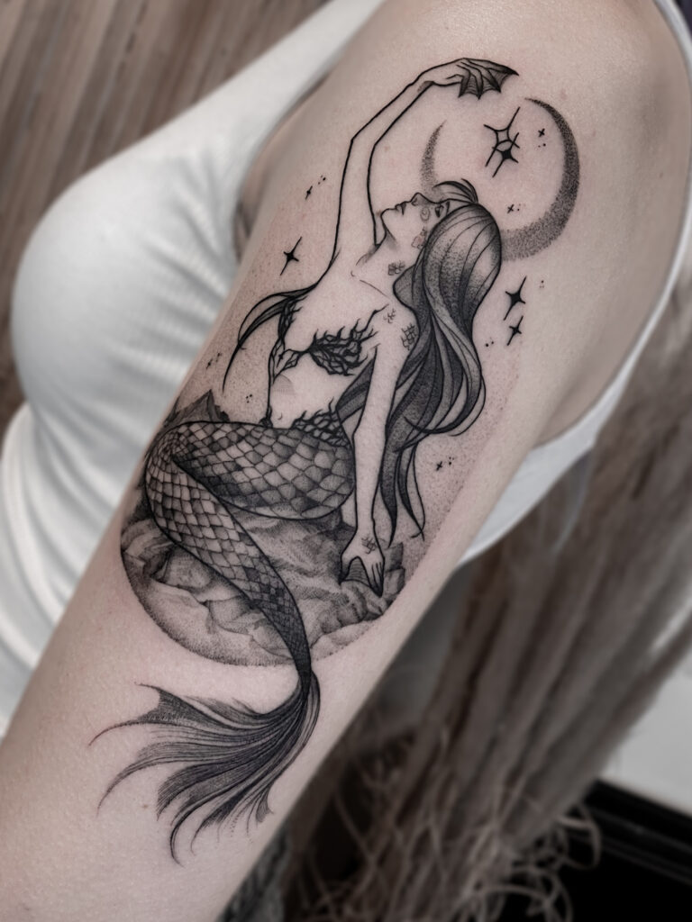 Blackwork illustrative mermaid tattoo with crescent moon and stars by Meow Ink Alex Lukasiewicz in Den Haag